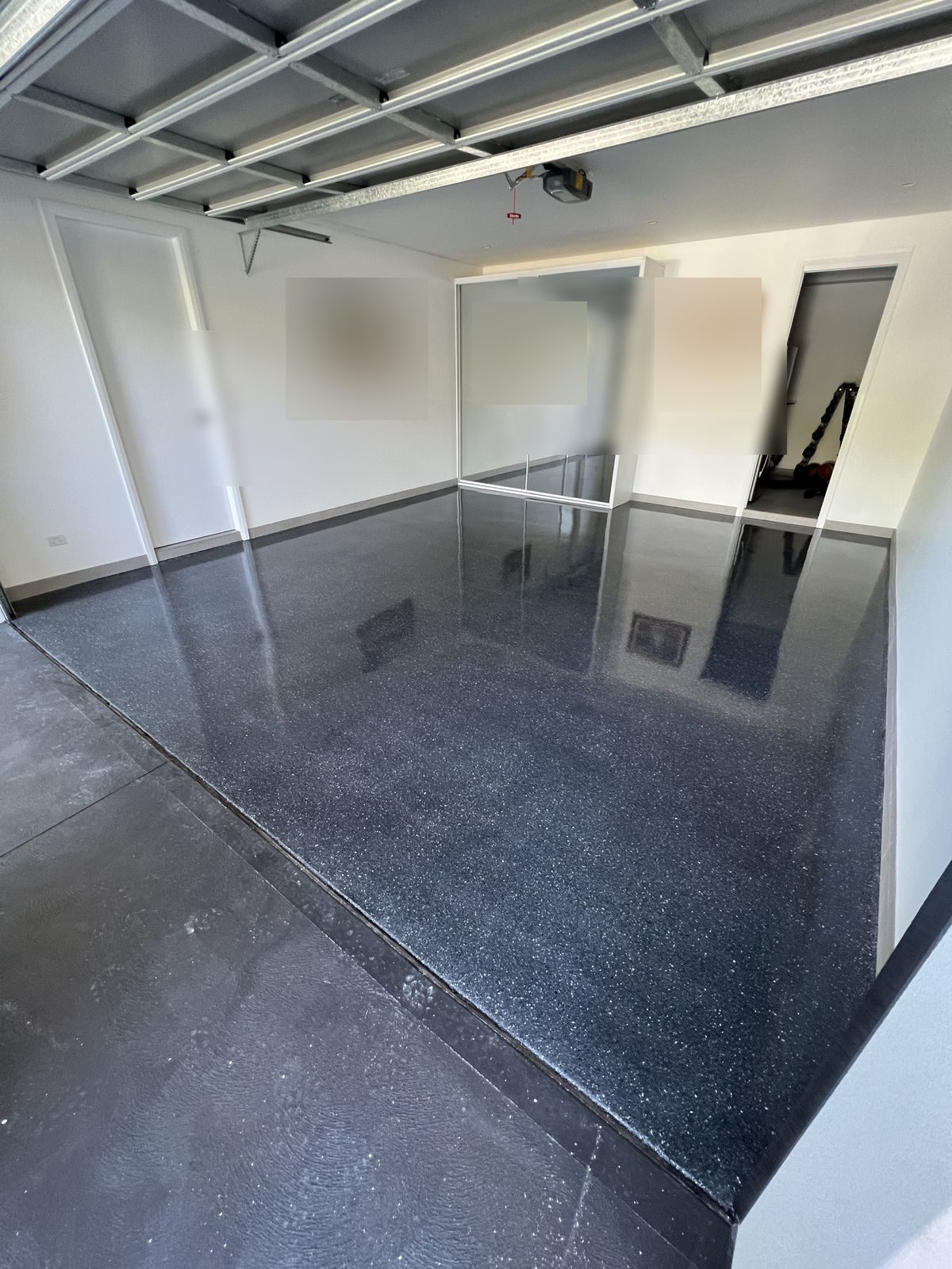 After. Finished 4 coat flake epoxy garage floor by Epoxy Floor Sealers